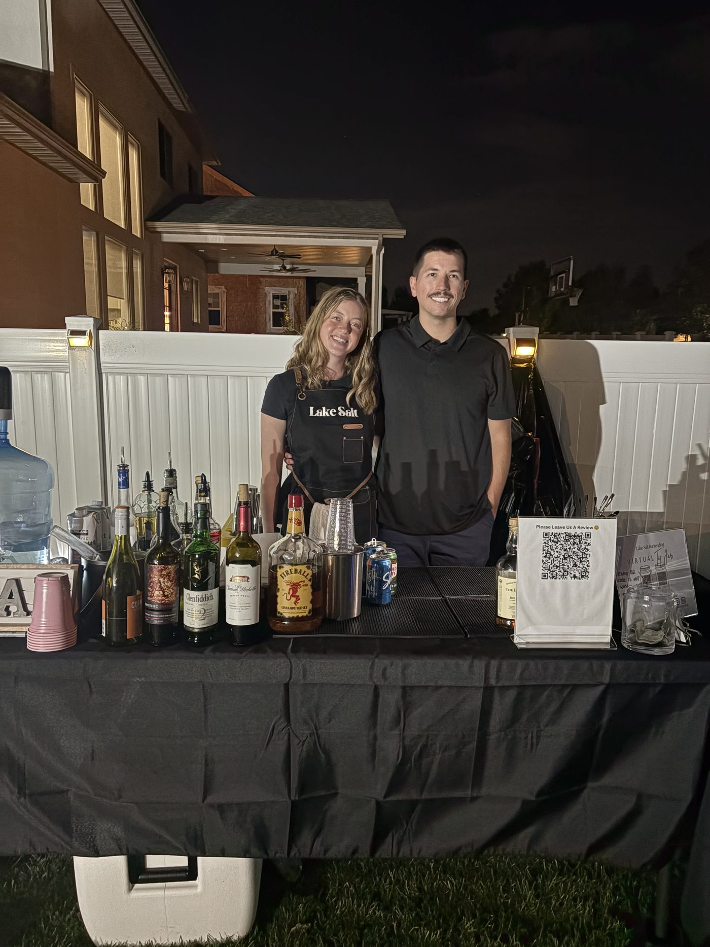 Lake Salt bartenders at a private outdoor evening event