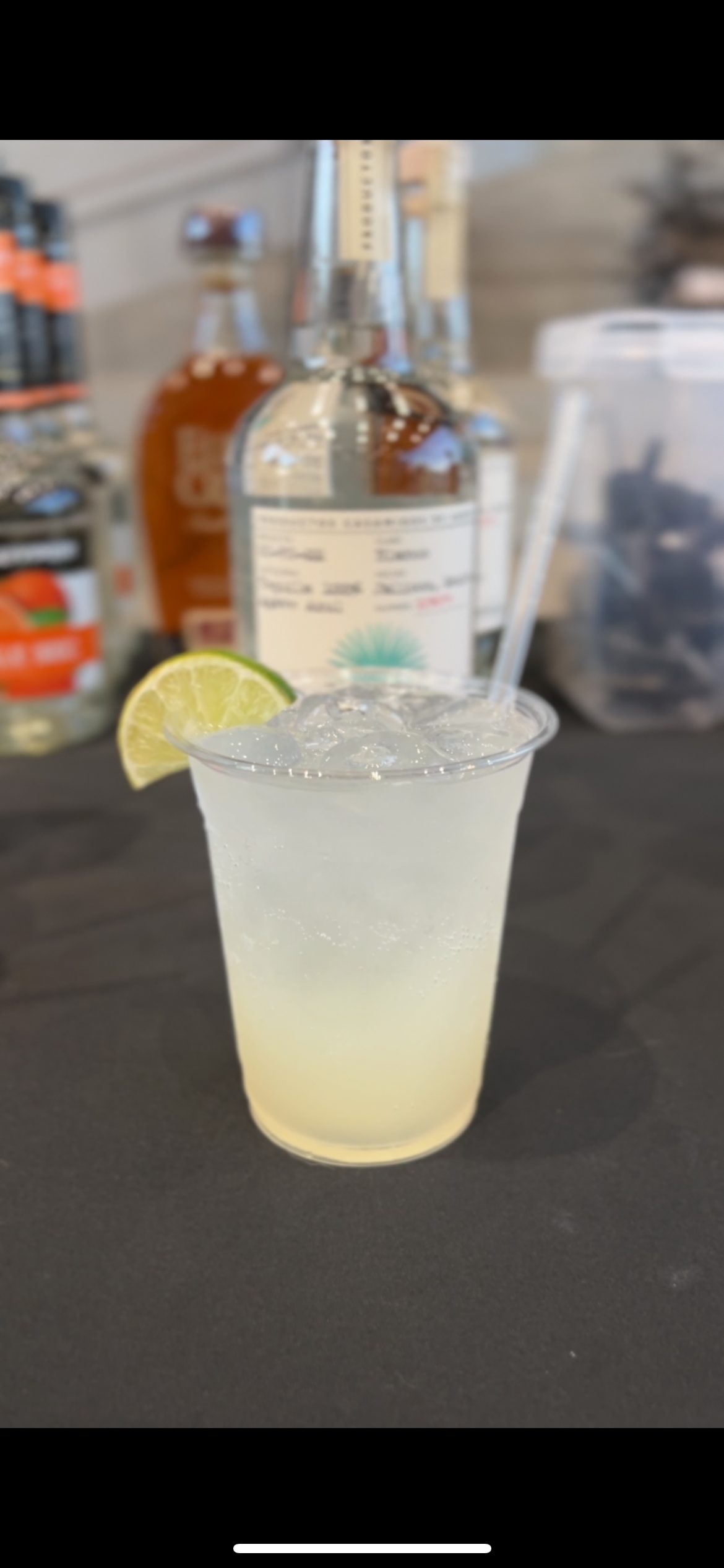 Freshly crafted margarita with lime garnish